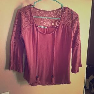 Rose colored Maurice’s top.